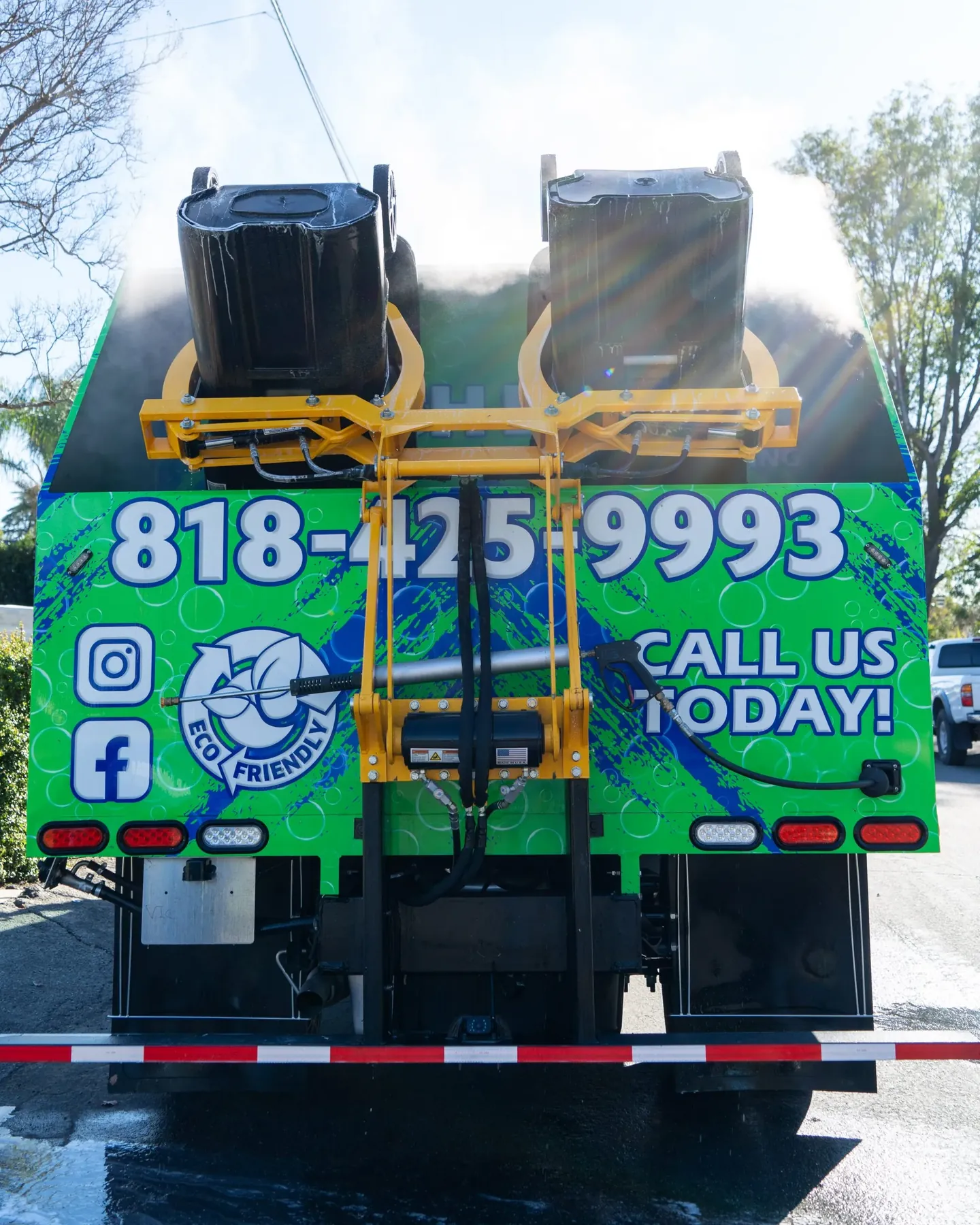 Two bins loaded on the Fresh Bins LA truck for cleaning